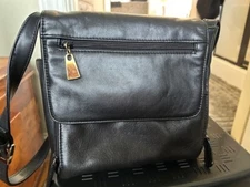 Aurielle Black Leather Crossbody Multi-purpose bag.