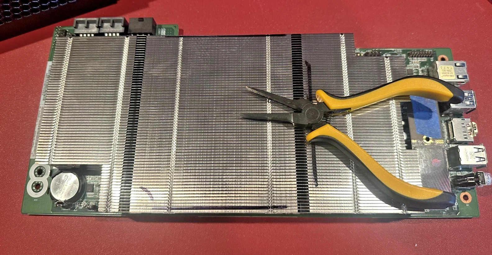 Opening heatsink fins with pliers