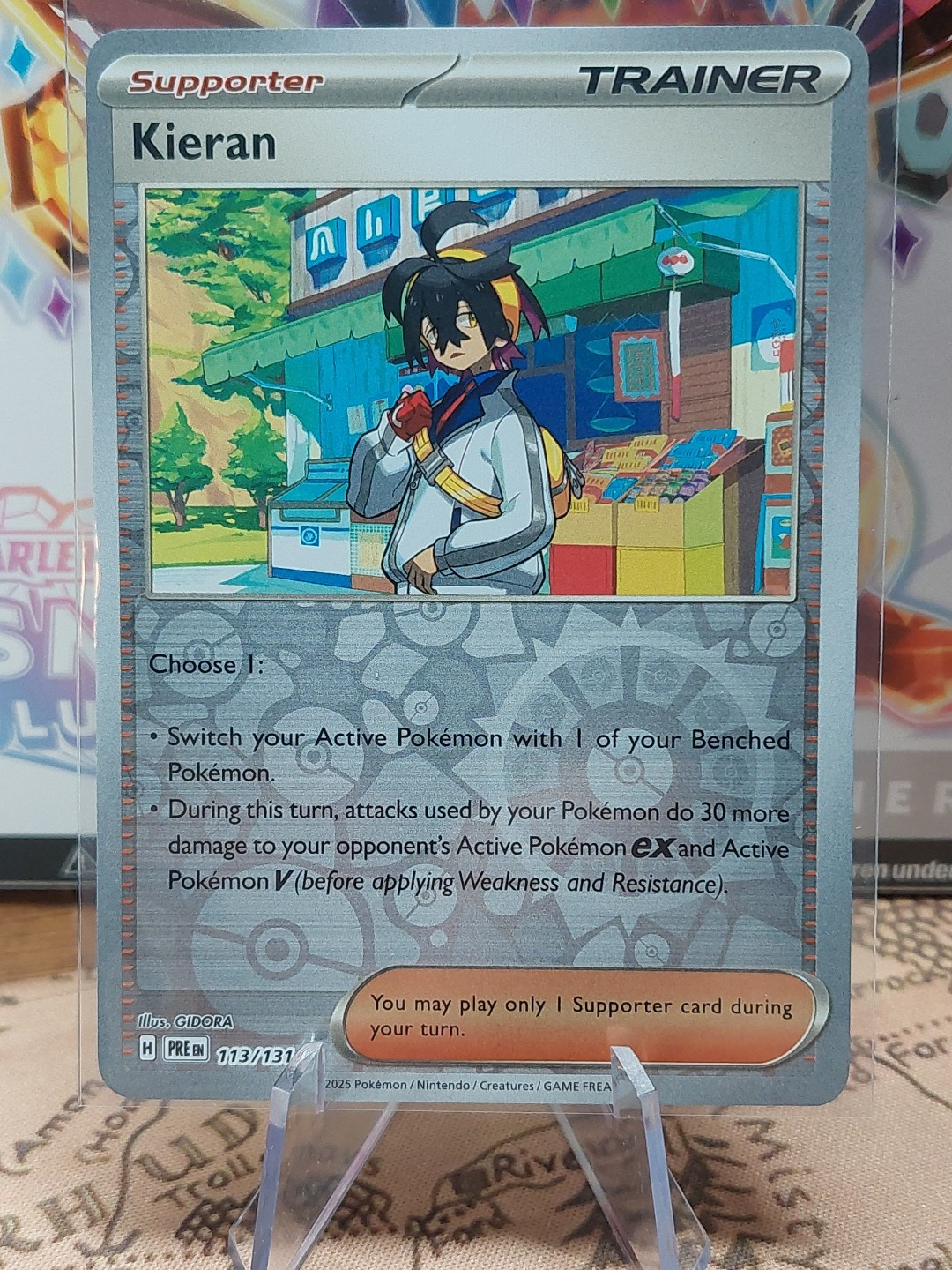 Kieran Reverse Holo NM 113/131 SV: Prismatic Evolutions Pokemon