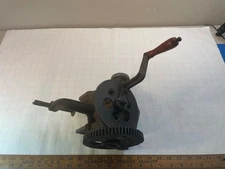 Antique hand crank grinder bench attachment