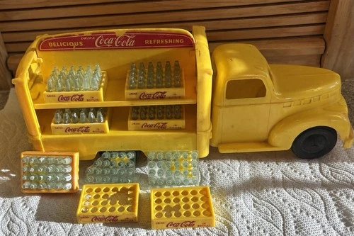 Vintage, Early 1950’s Plastic Coca-Cola Truck With 7 Cases Of Miniature Bottles