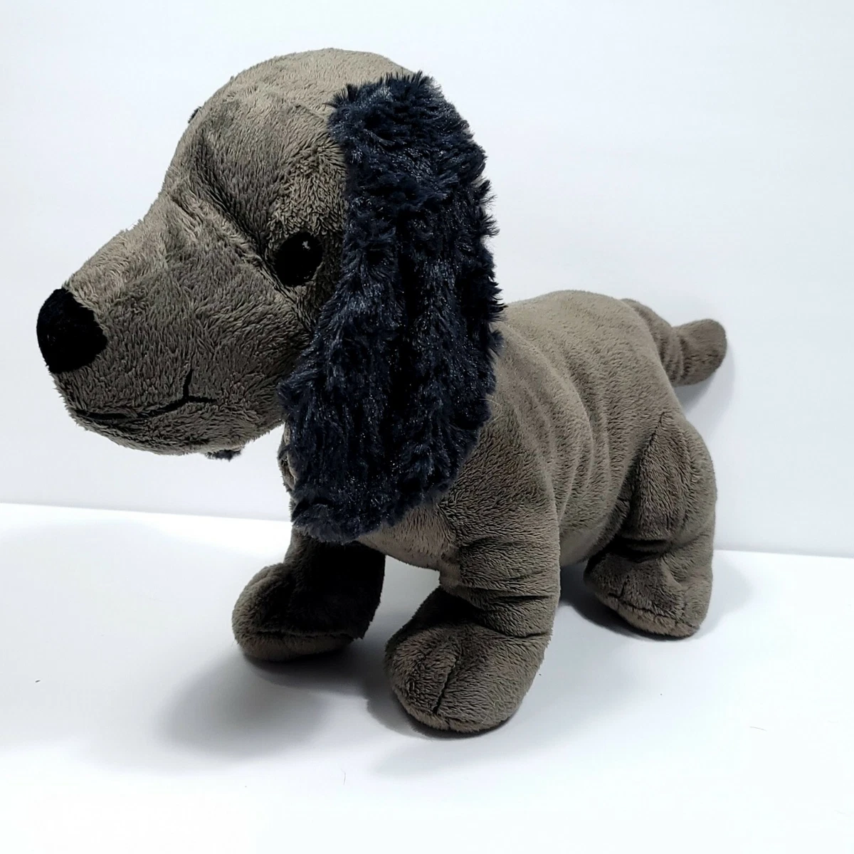 Gray dog on sale stuffed animal