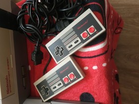 Nintendo nes two controllers  And Games.