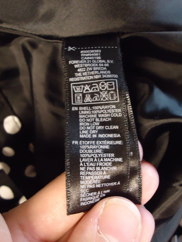 Falda Forever 21 Essentials negra/blanca plisada a lunares línea A para mujer talla S/P - Imagen 6 de 9