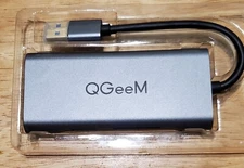 QGeeM mini usb Docking station. Support SD and Micro SD.