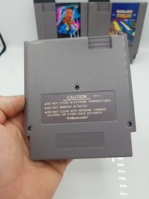 NES Games Bundle Of 4 Ikari Warriors 2 Tecmo Bowl Bionic Commando Winter Games