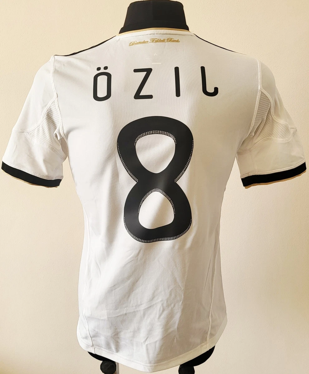 Preços baixos em Mesut özil Alemanha Branco National Team Roupas e
