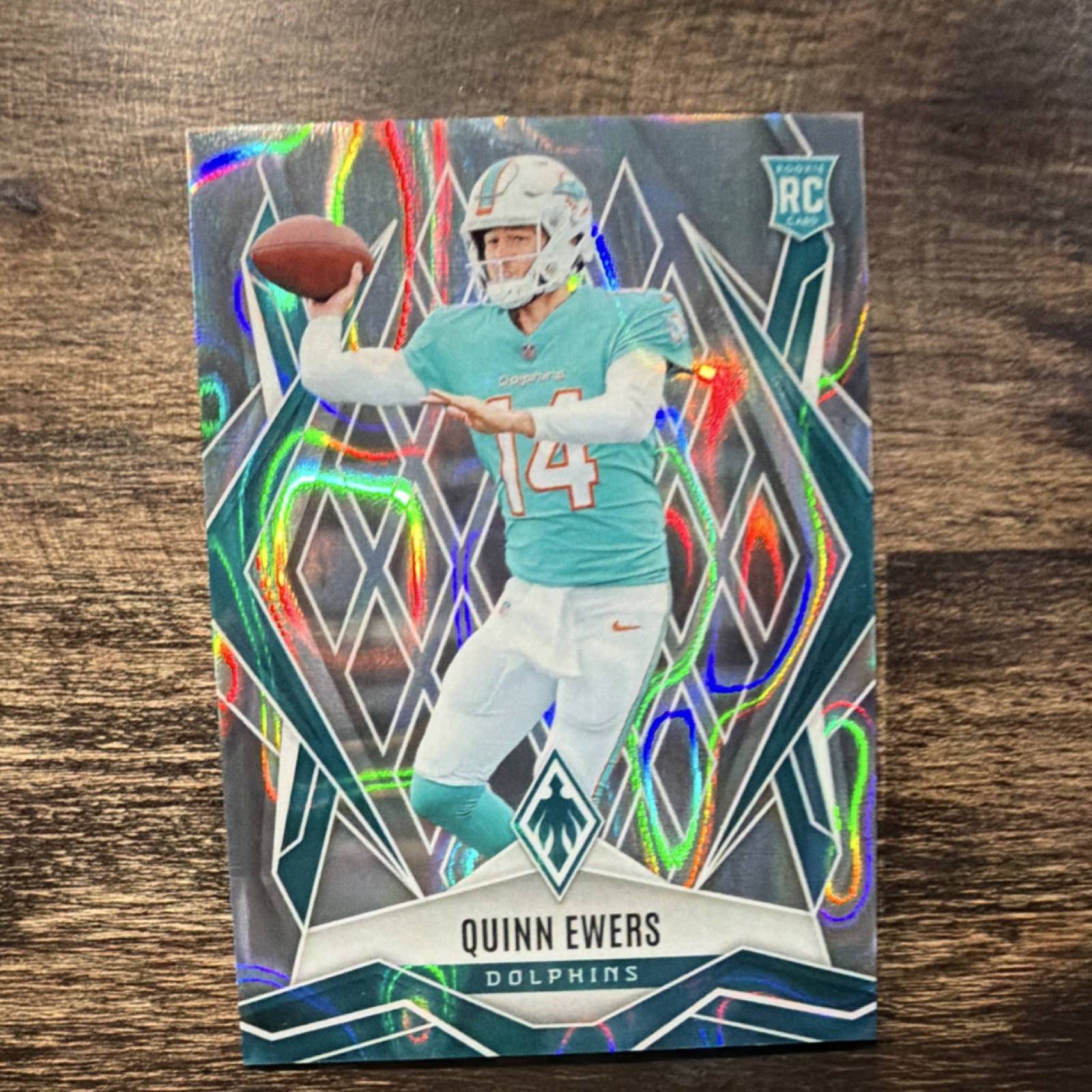2025 Panini Phoenix Rookies Quinn Ewers Light Blue Lava Dolphins #159 /325