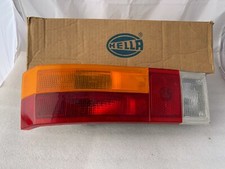 VW Passat B1 Typ 32 Rücklicht + Lampenträger links Hella 2VP002784-151 NEU NOS