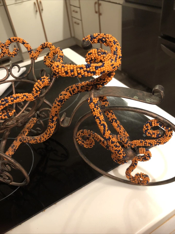 Mini bicicleta de hierro con cuentas naranja y negro Foto 3 de 4