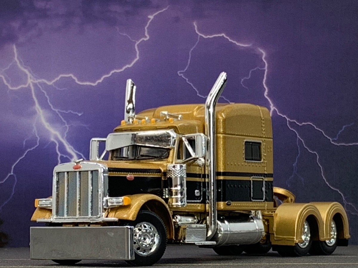 まみページ 1/64 DCP GOLD/BLACK PETERBILT 379 W/ 70