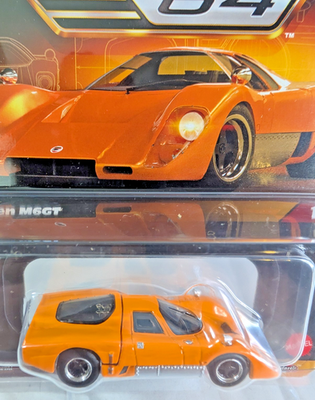 Hot Wheels Elite64 1/64 – McLaren M6GT #12 – Roues Gommes 2025 – NEUF