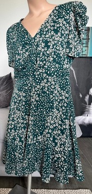 Elegantes Damenkleid von DKNY Gr. 40 grün mit Blumenmuster 