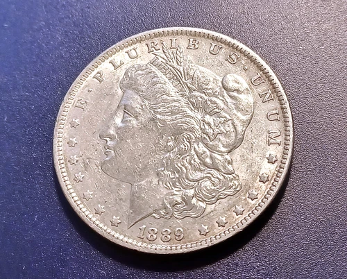 Choice AU 1889-O Morgan Dollar