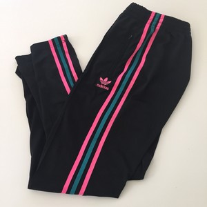 black neon green stripe adidas pants