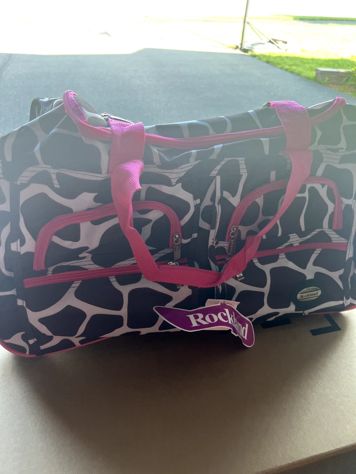 Bolso de Viaje Rockland para Pasar la Noche - Jirafa Rosa Y Marrón - 22" - Ruedas/Mango Foto 2 de 4