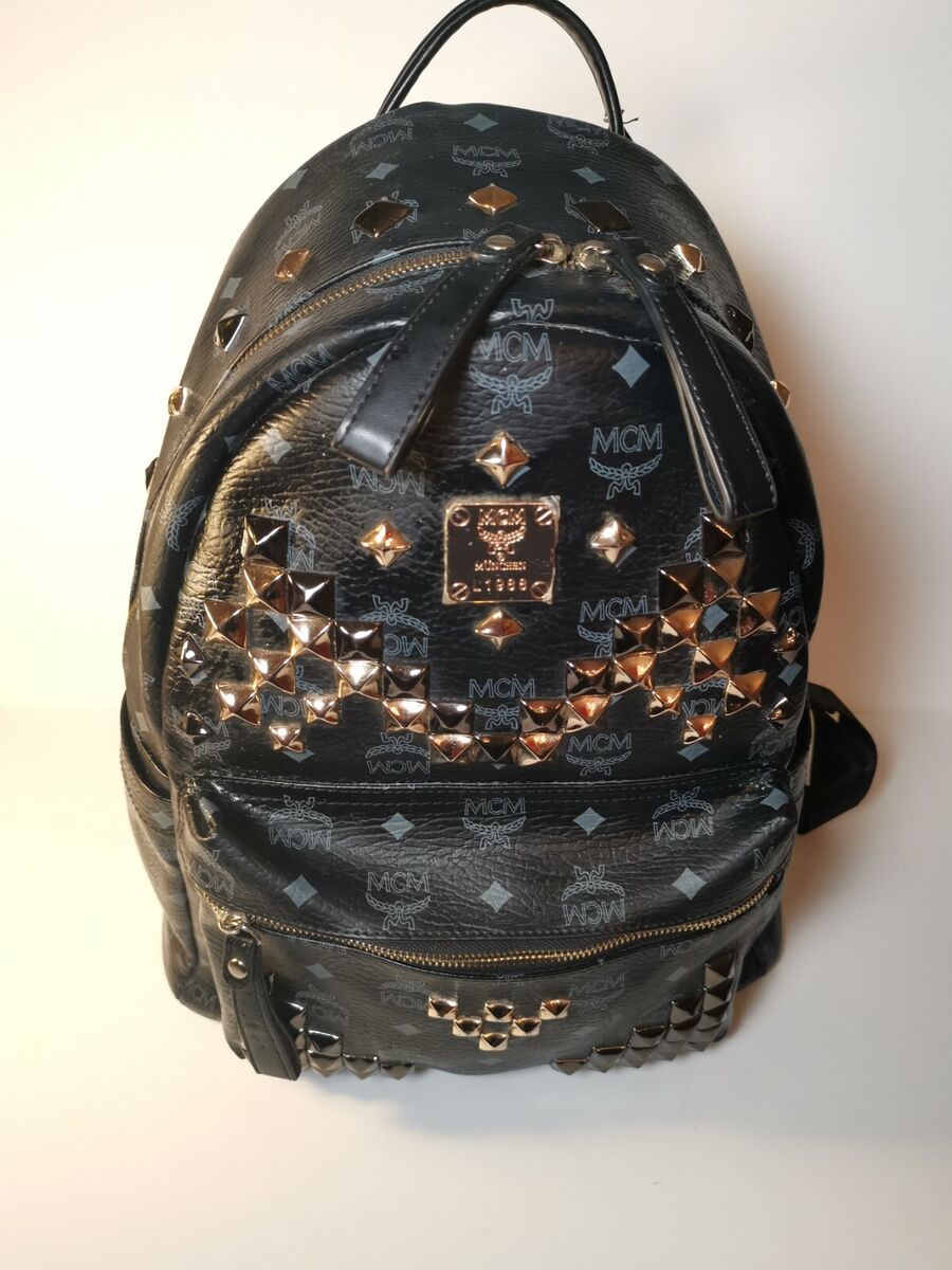 MCM Black Visetos Stark Insignia Black gold & silver Studded MCM Black Visetos Stark Insignia Black gold & silver Studded
