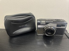 Revere 3M Automatic 1034 Film camera 1960 s With Case
