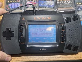 Vtg LOT Atari Lynx II Console Bundle 7 Video Games Case Adapter Visor Works MINT