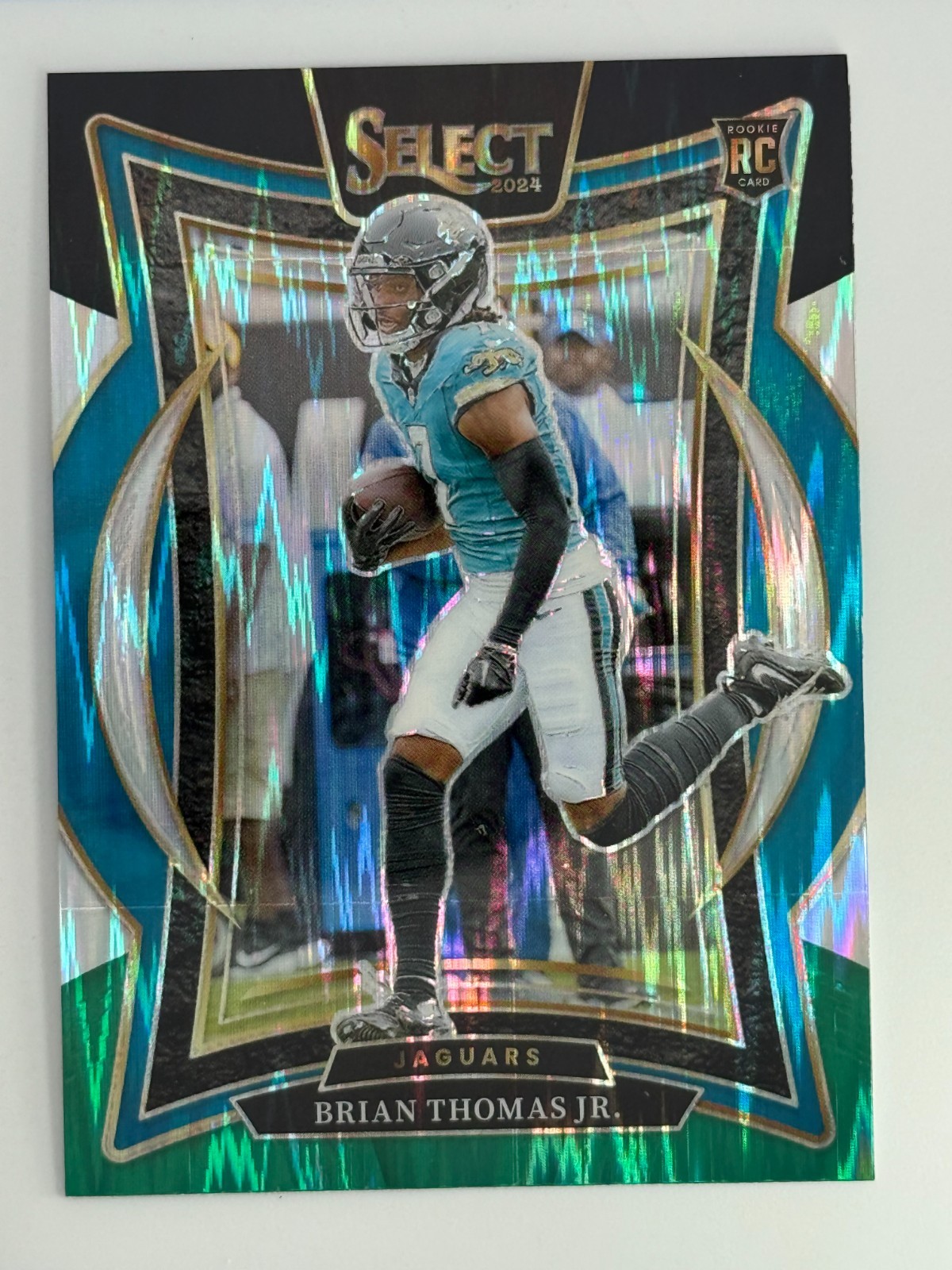2024 Select - Concourse Brian Thomas Jr. #91 Black & Green Shock Prizm (RC)