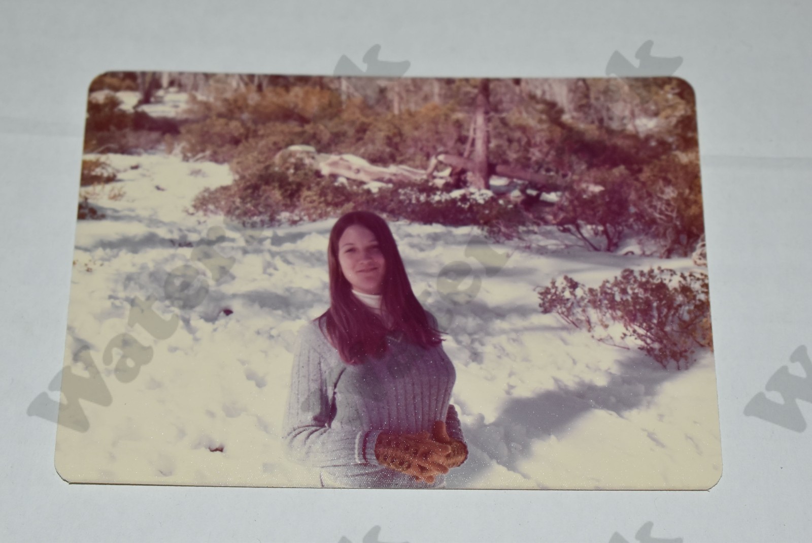 outdoor-candid-busty-redhead-woman-in-tight-sweater-vintage-photograph