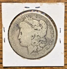 1884 "O" MORGAN DOLLAR  silver maybe just scrap.