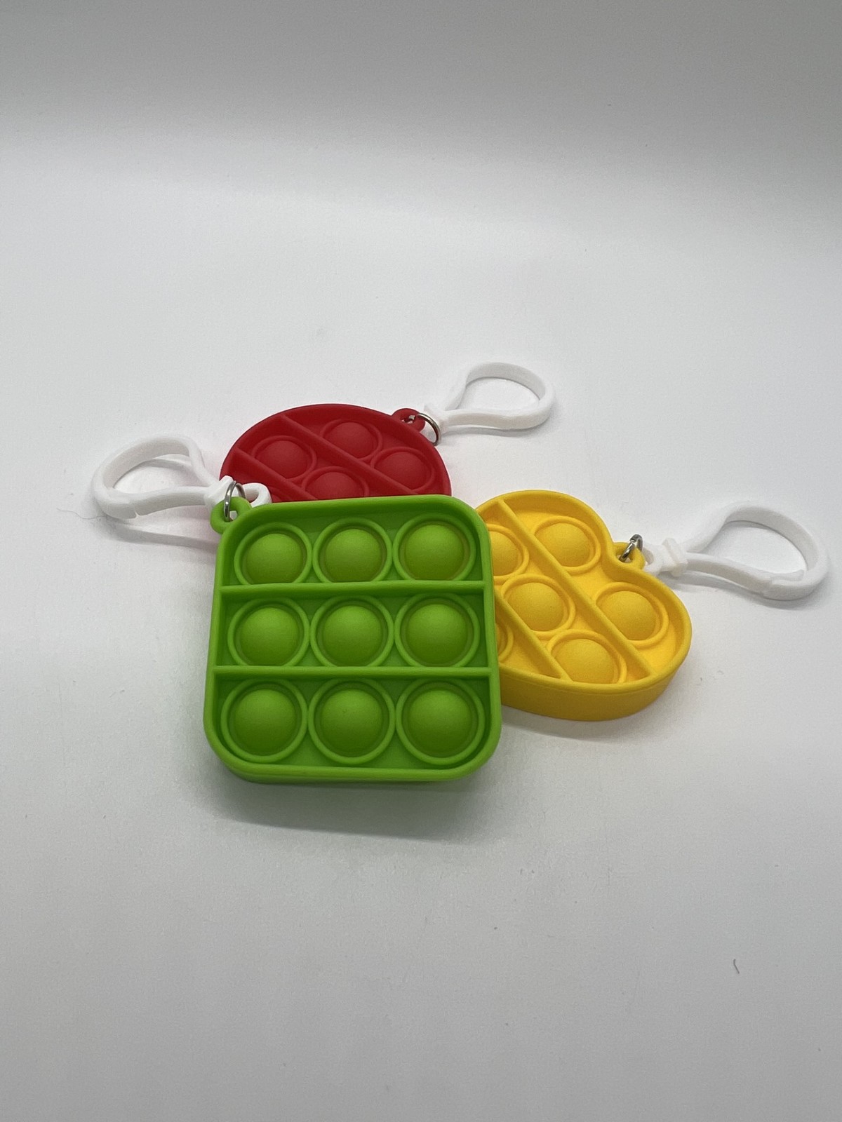 Захватывающий брелок в пузырчатой упаковке Pop-It с призом в виде Гачапона случайный 2090₽