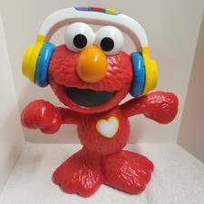Sesame Street 2017 Let's Dance Elmo 12in Elmo Toy Sings and Dances w/Headphones