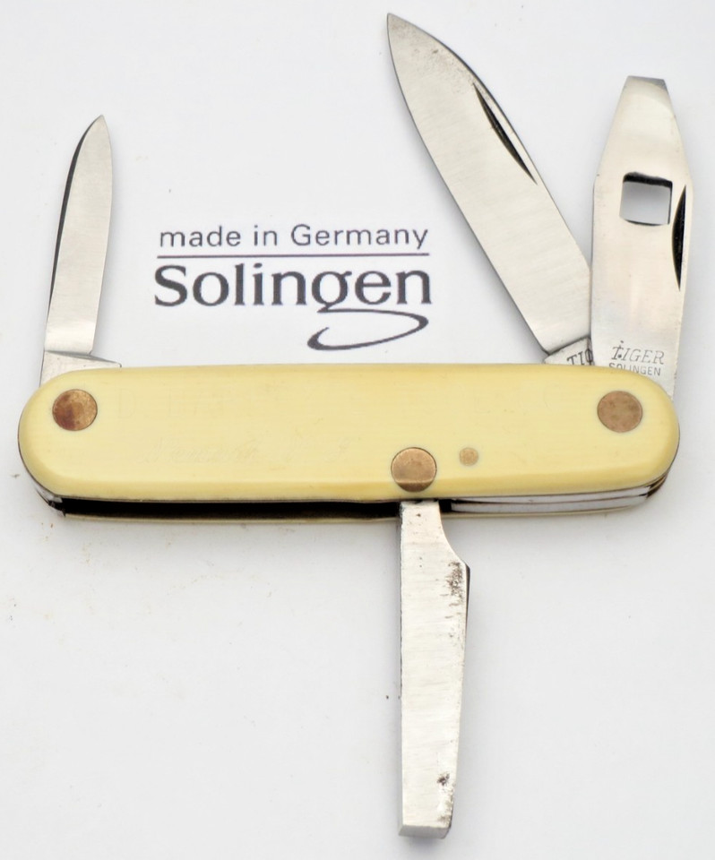 A rare Solingen house painter's specialty knife — the kind of hyper-specific trade tool that barely exists anymore and looks incredible on a shelf.