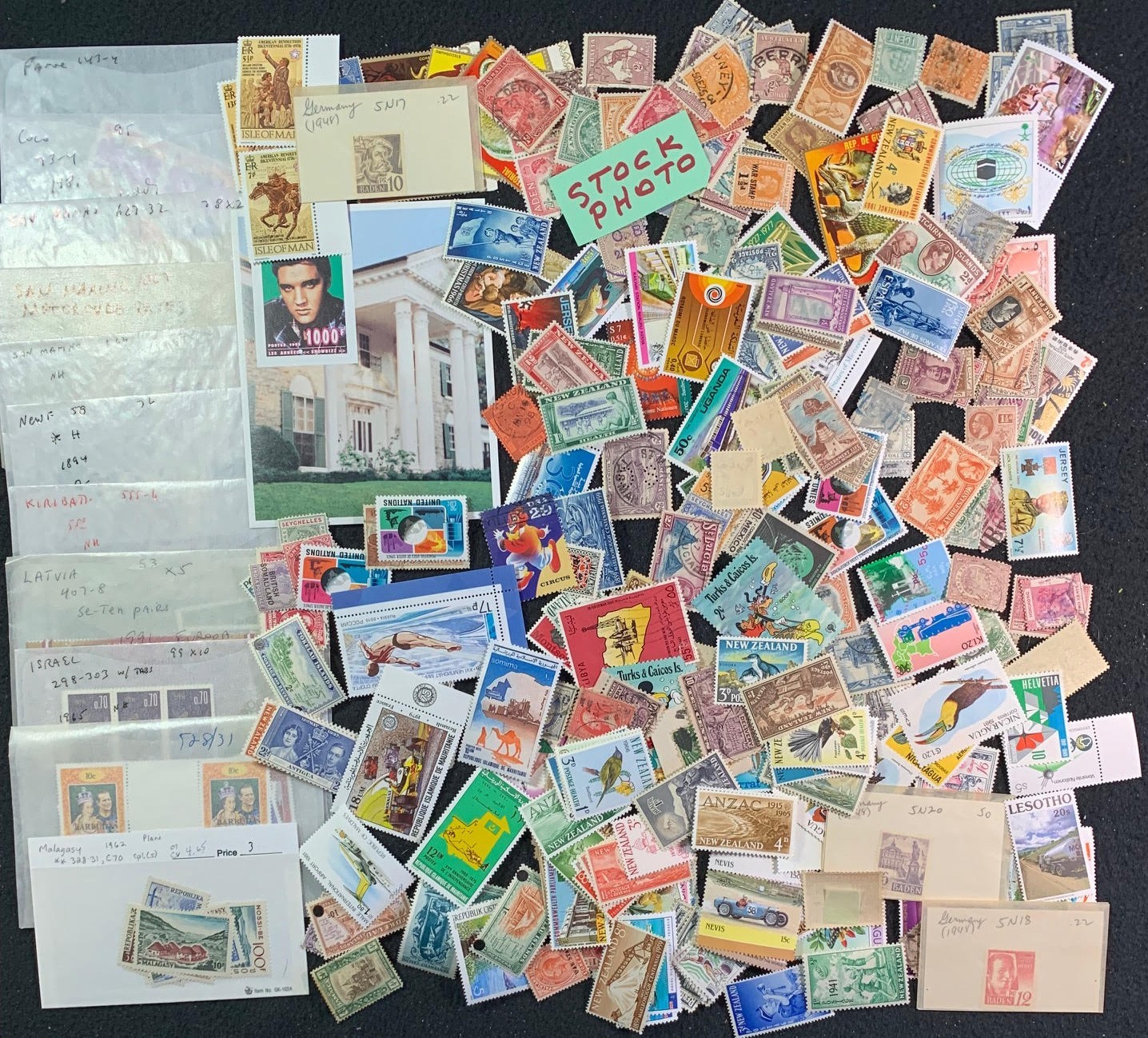 100 or more different Worldwide stamps & sets incl British - mint & used -- (36)