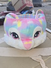 plush Easter basket styled to look like a rainbow bunny