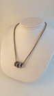 Sterling silver sterling silver necklace with ornate slides marked AT