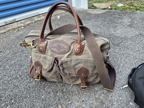 Frost River Correspondent Briefcase, crafted from durable waxed canvas with...