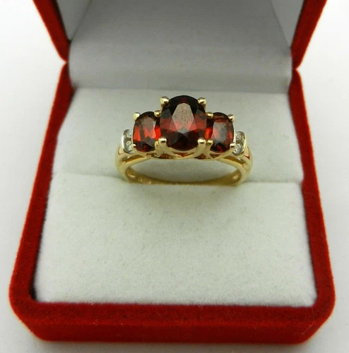 3Ct Oval Cut Red Garnet Three Stone Women's Engagement Ring 14K Gold Finish