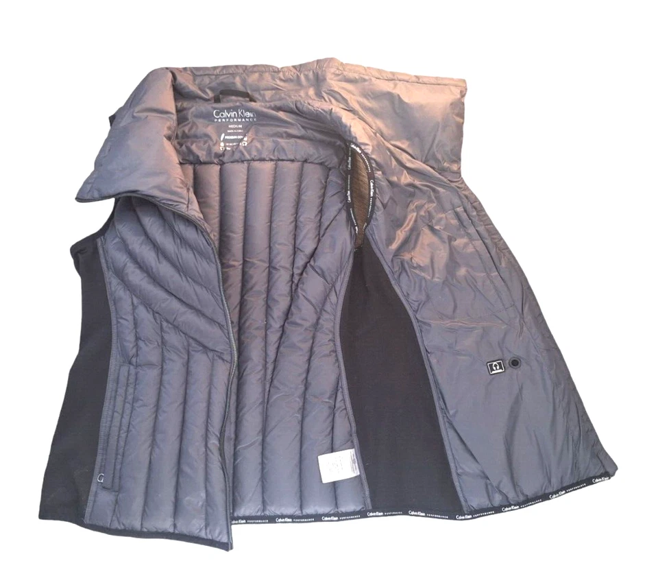 Chaleco acolchado asimétrico relleno de plumón CALVIN KLEIN Performance para mujer gris MEDIANO Foto 2 de 4