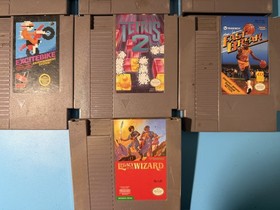 Nintendo NES-001 Console Lot w/ Controllers Zapper Light Gun and 7 Games