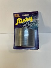 VINTAGE TOY 2 3/4" ACROSS ORIGINAL METAL SLINKY WALKING SPRING TOY In Package A7