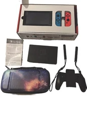  Used Blue and Red Nintendo Switch - Galaxy Traveling Case and TV Adapter