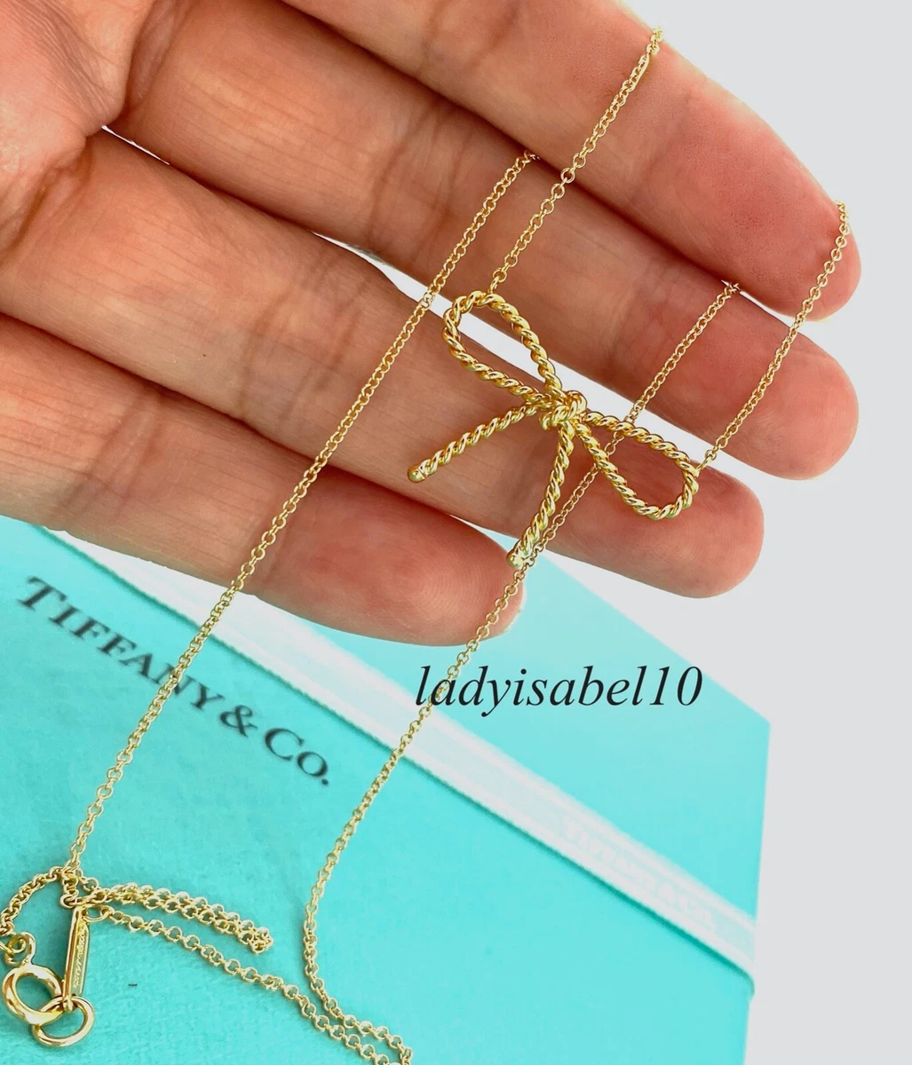 Tiffany gold shop bow necklace