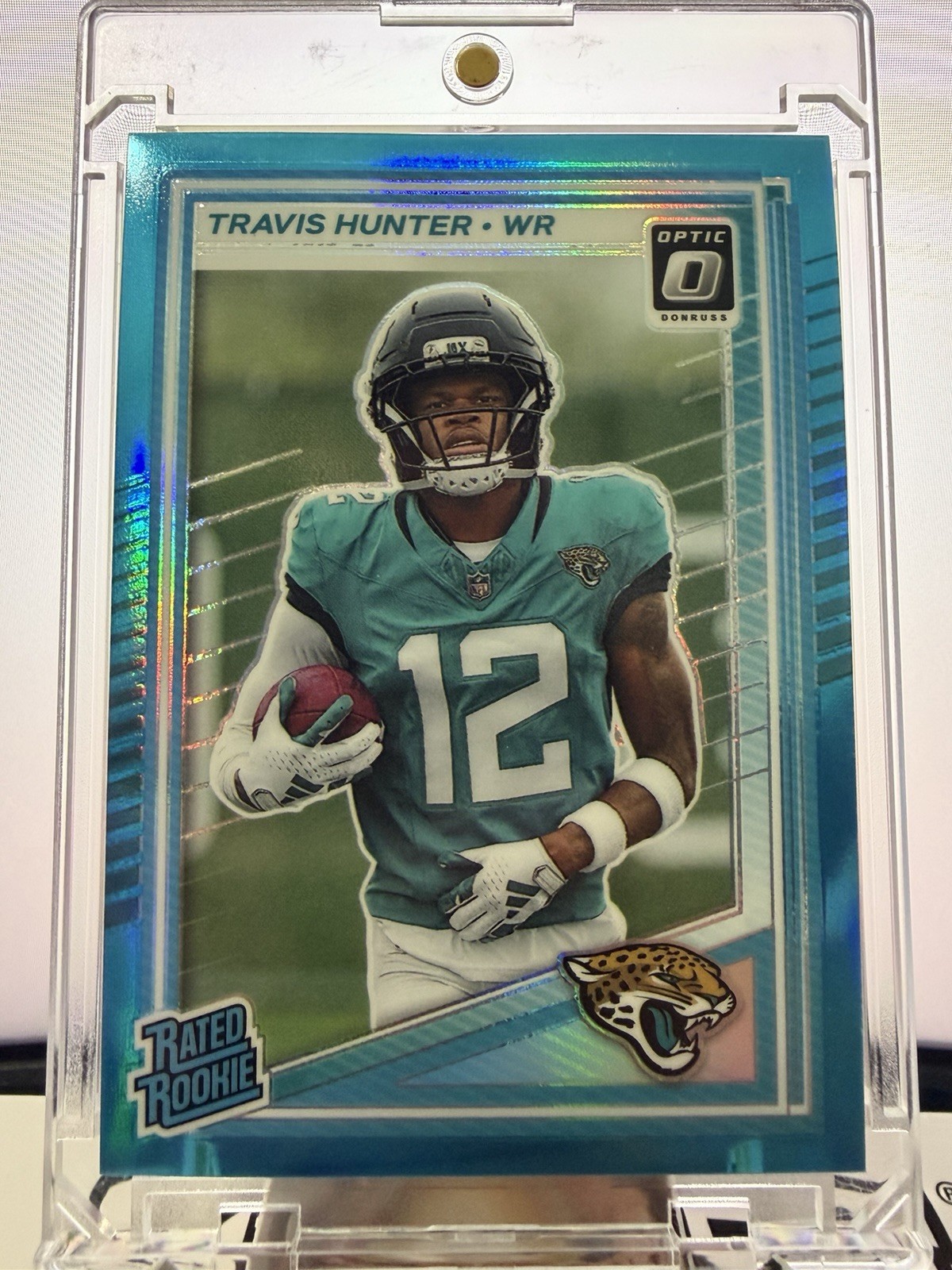 Travis Hunter - 2025 Panini Donruss Optic- Rated Rookie Aqua Prizm (RC) /399