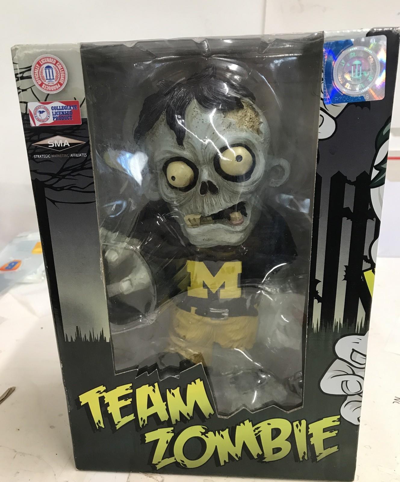 Figura Forever Collectibles Team Zombie U Of M