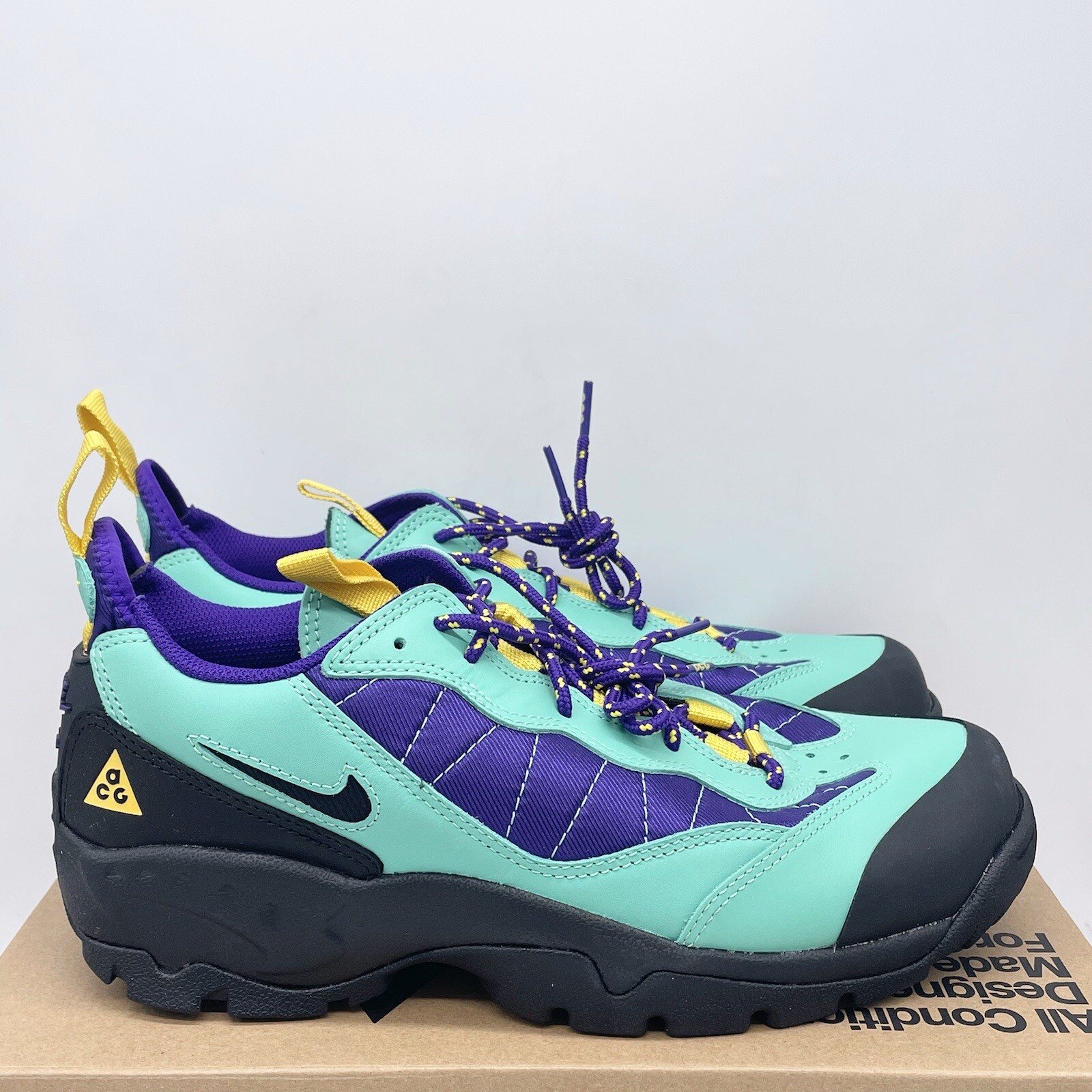 acg air mada rubber trimmed leather and mesh hiking sneakers