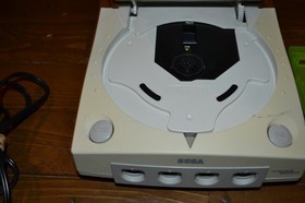 Sega Dreamcast (HKT-3020)with 2 controllers  Resident Evil Code:  & Memory card