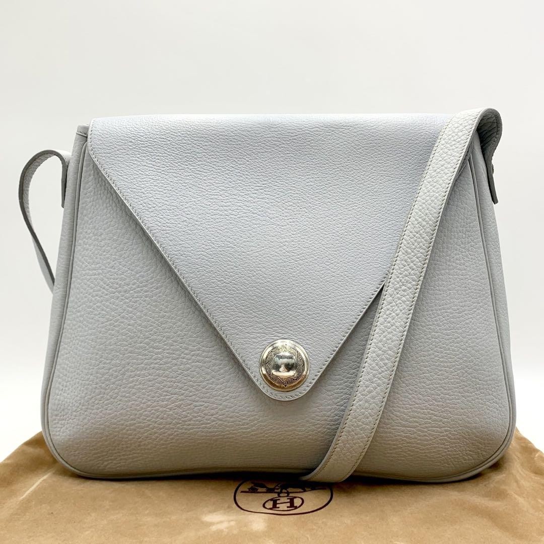 HERMES Christine E shoulder bag in blue and white with engraved detail #PG8LBH