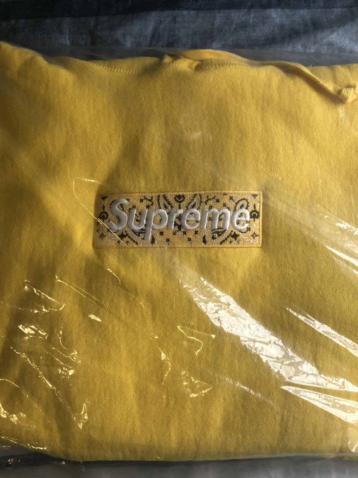 yellow bandana box logo