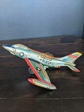 US Navy jet Japan made Vintage tin Lithograph Airplane Demon friction e.t.c.o.