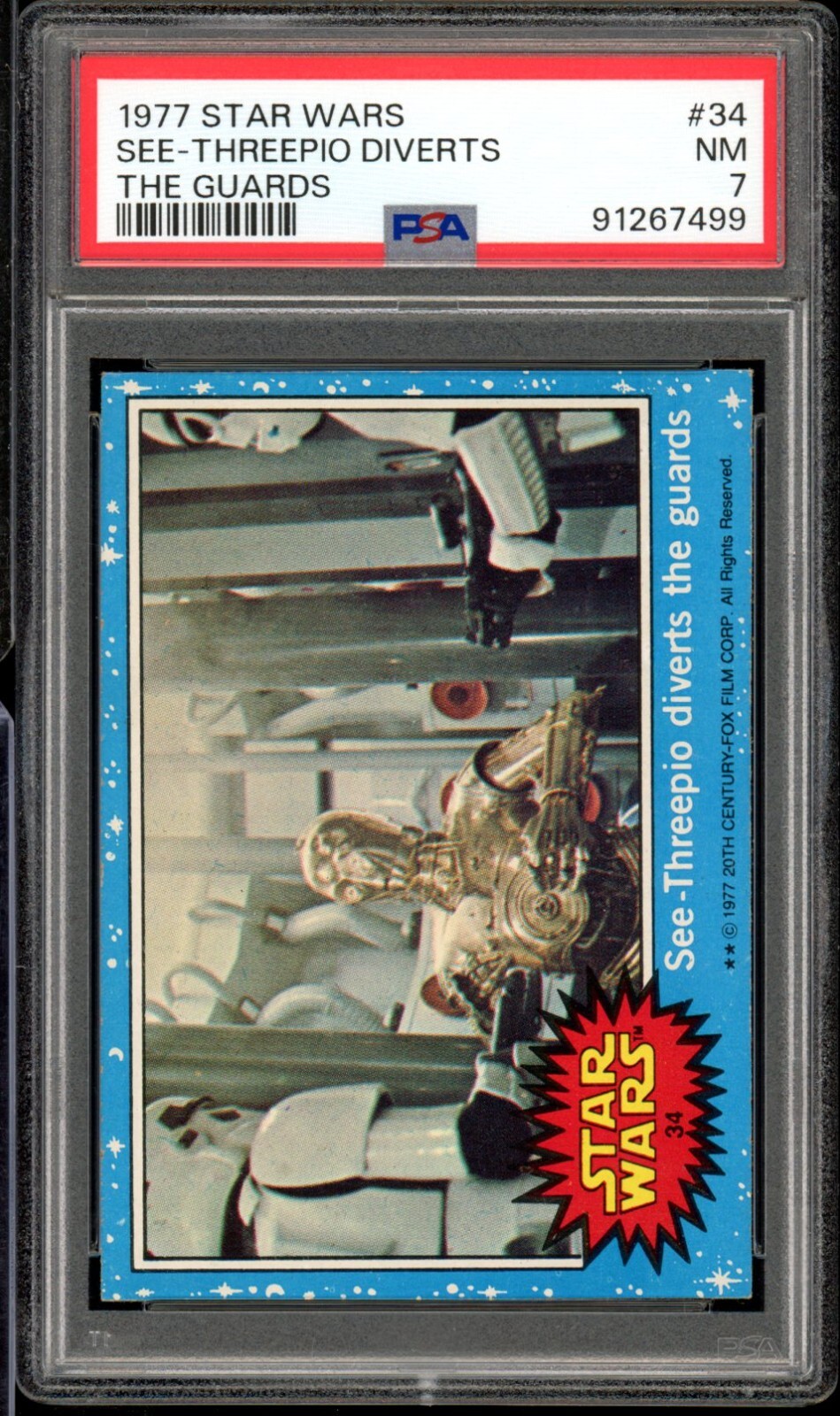 1977 Star Wars Topps #34 See-Threepio Diverts The Guards PSA 7 NM