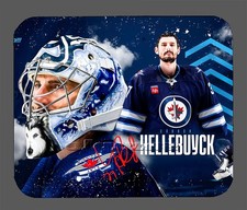 Connor Hellebuyck Winnipeg Jets Autographed Mouse Pad Item#10490