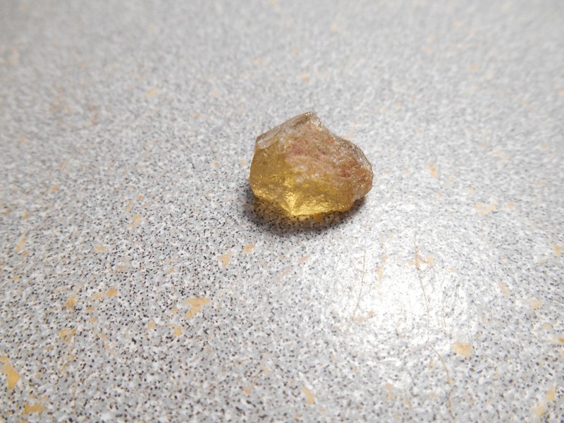 Grossular garnet faceting rough med. light  yellow.  7.6 ct. clean. Tanzania.