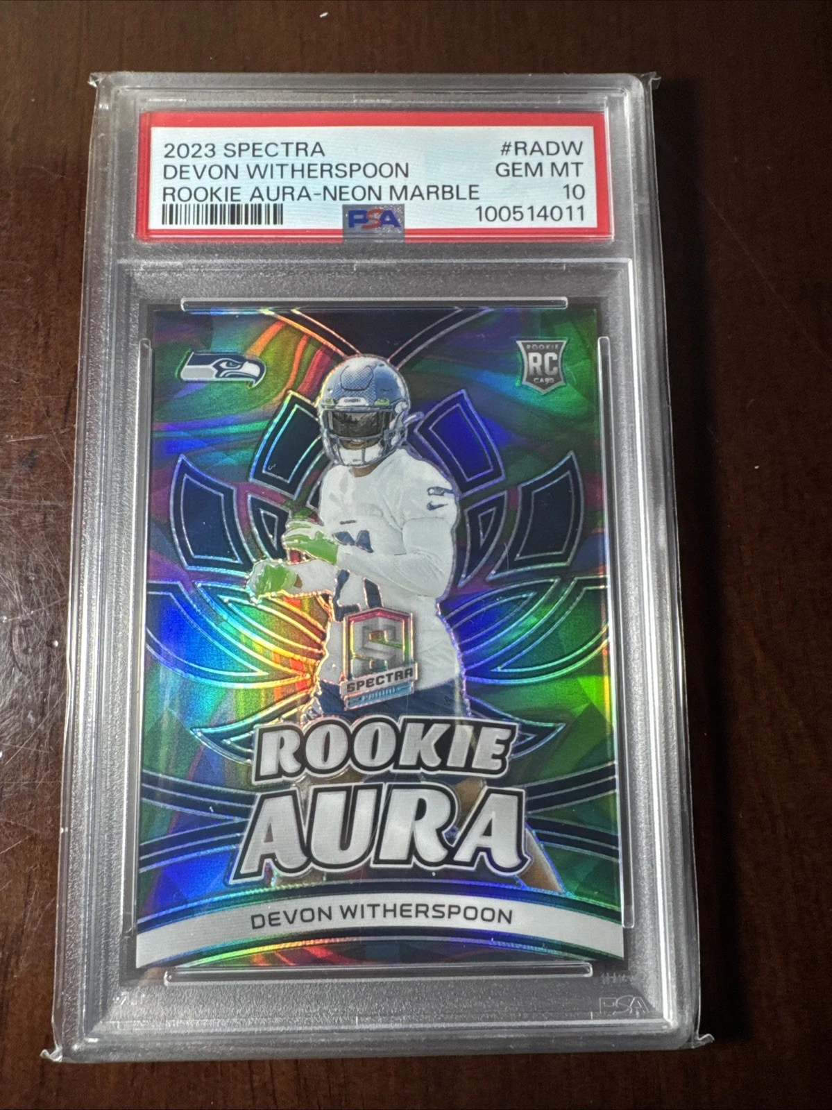 Devon Witherspoon Panini Spectra Rookie Aura #RADW Neon Marble